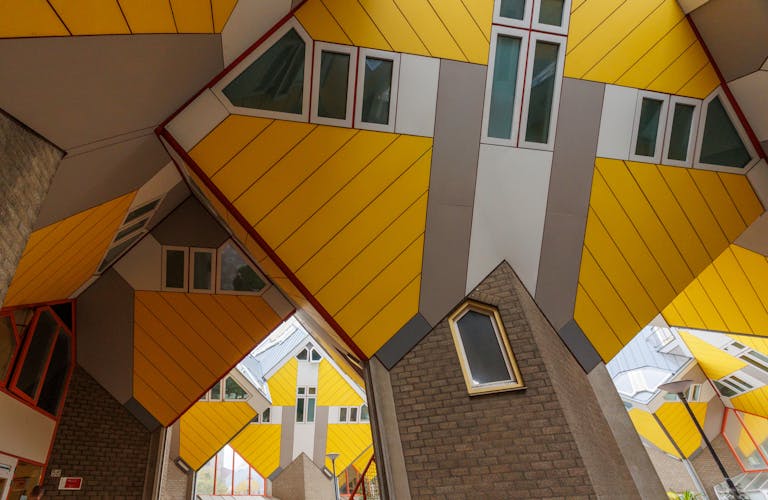 Dynamic angle view of iconic Cube Houses in Rotterdam, showcasing modern Dutch architecture.